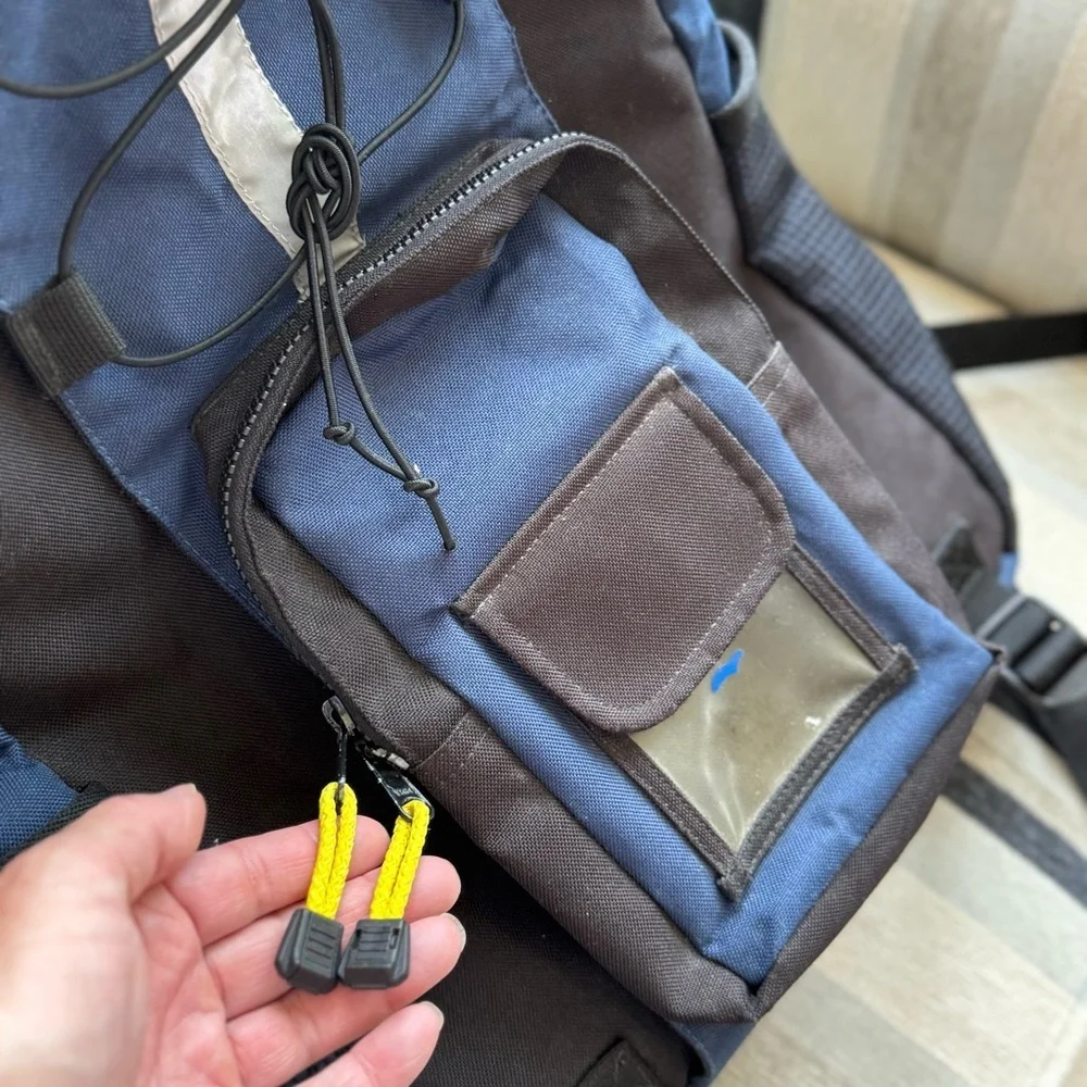 Yak Pak Blue and Black Backpack with Yellow Details